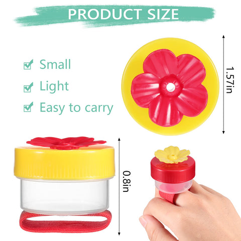 Zopeal hummingbird ring feeder worn on hand with adjustable strap