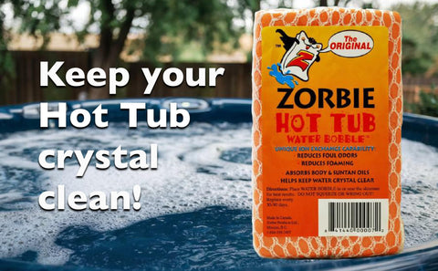 Orange floating Zorbie bobble with string visible in hot tub.