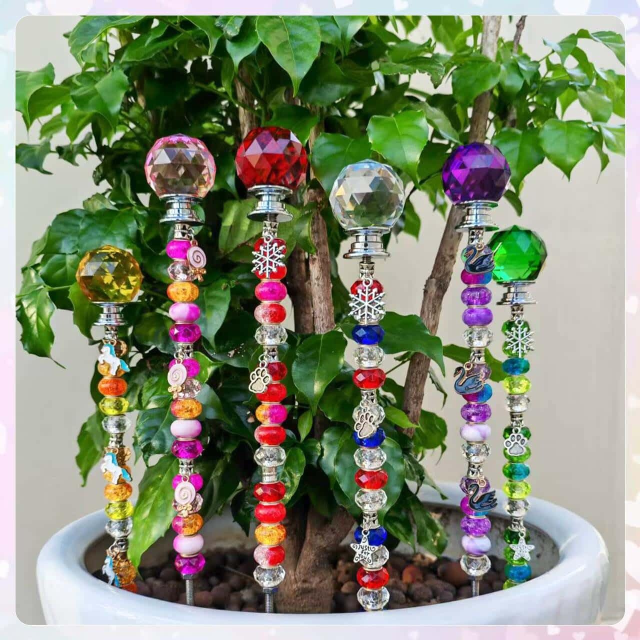 ZSlactp fairy garden stakes on display in a garden setting