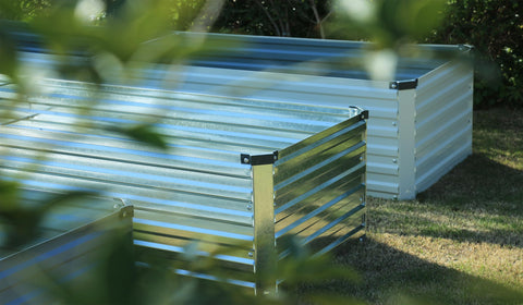 ZUNUDA raised bed in garden demonstrates accessible planting.