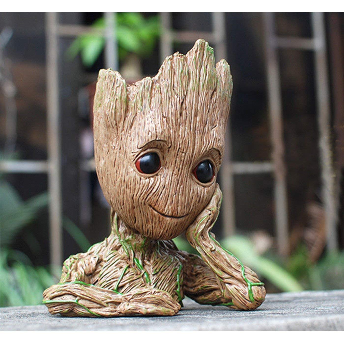 ZUSONUD Baby Groot action-figure planter blending decor and function.