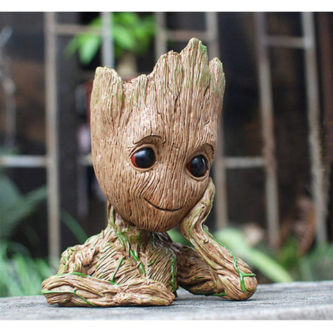 ZUSONUD Baby Groot action-figure planter blending decor and function.