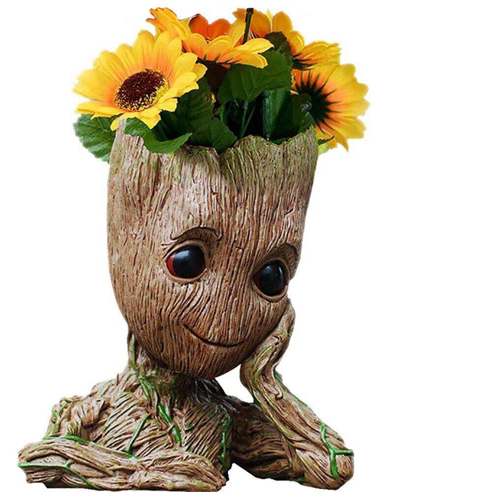 ZUSONUD Baby Groot pen pot on a tidy desk for organized writing tools.
