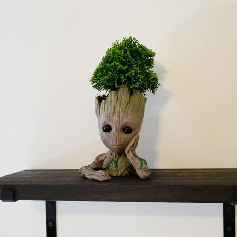 ZUSONUD Groot planter with hollow base providing stability.