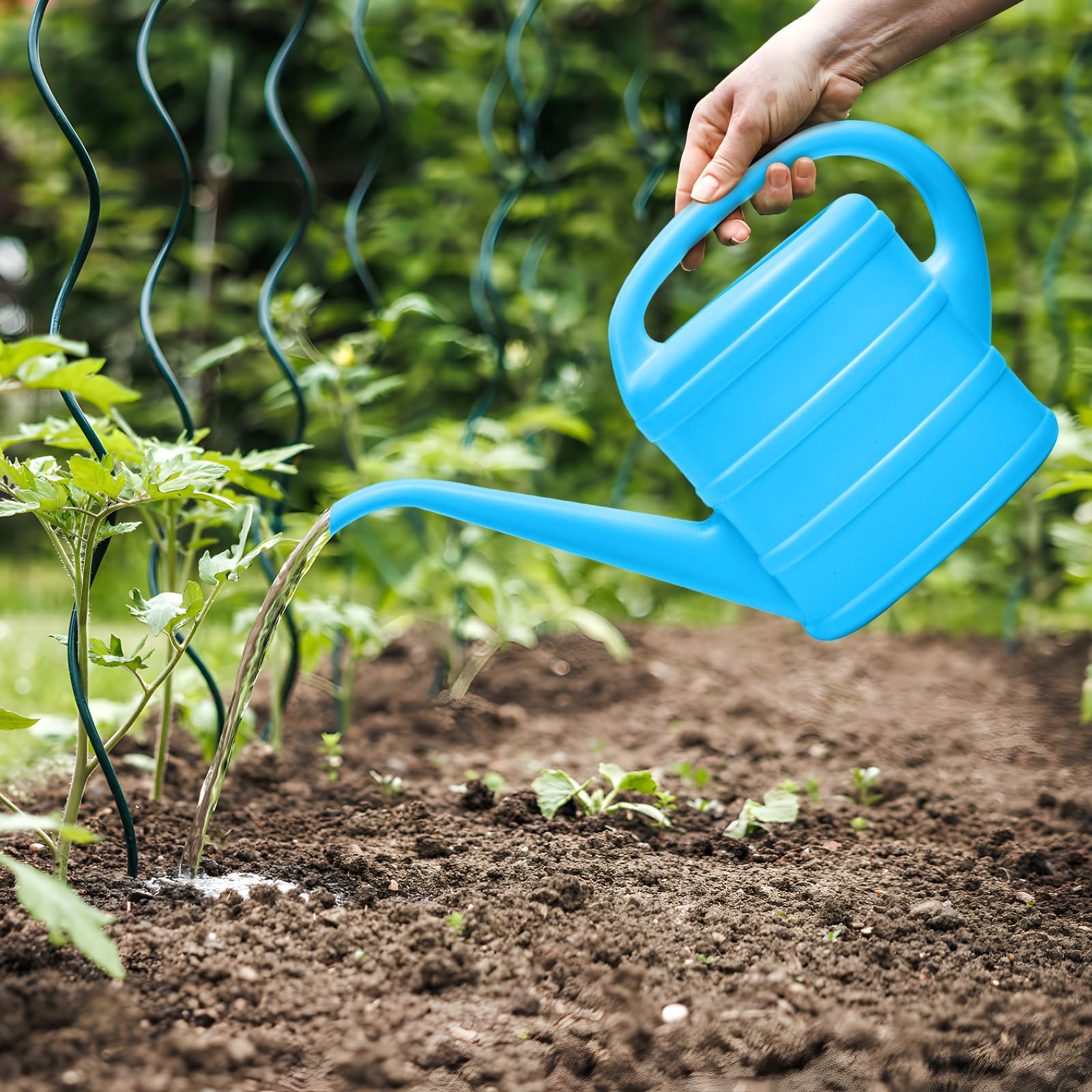 ZXJ blue watering can adds decorative charm to homes and gardens