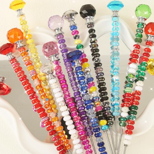 ZYEHXED fairy wand beads being assembled on a stake for customization